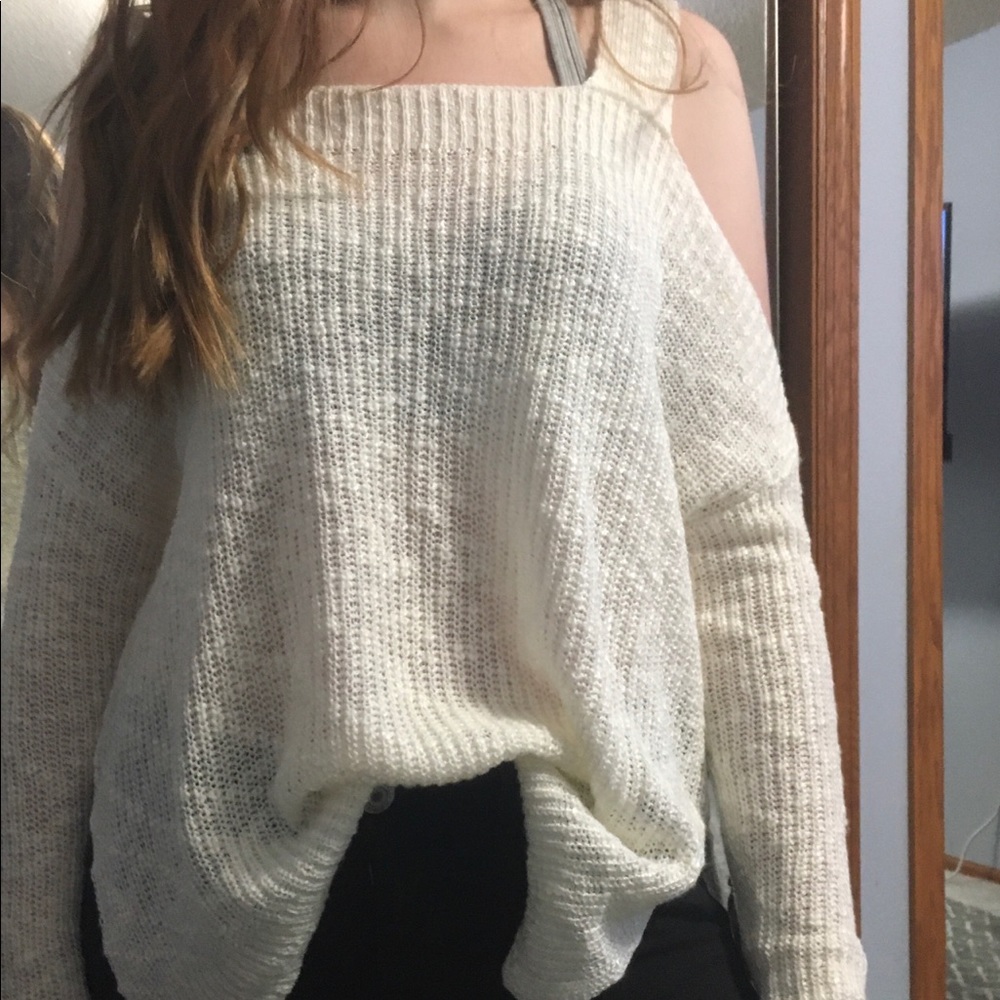 Off the shoulder long sleeve shirt.